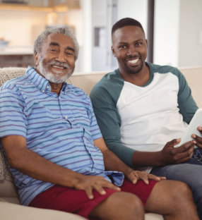 Two men sitting together